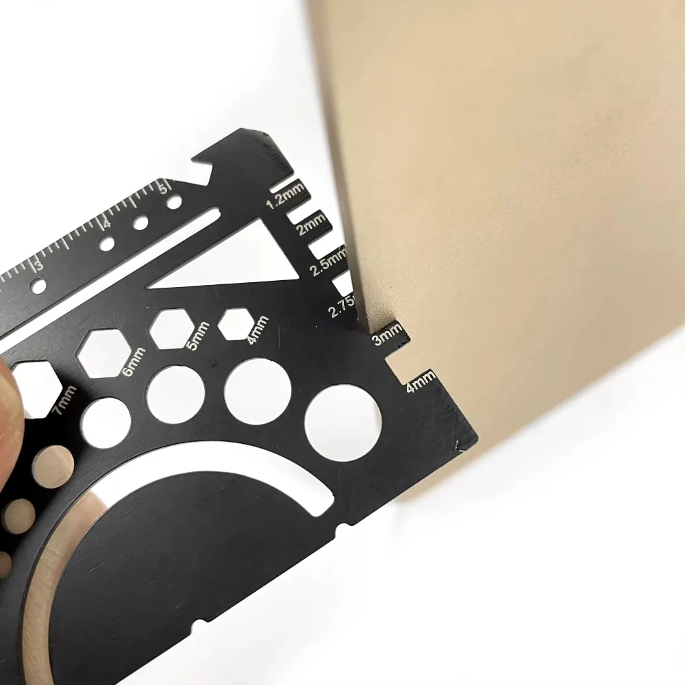 Credit Card Multitool 1 getting used to check thickness of wooden tile
