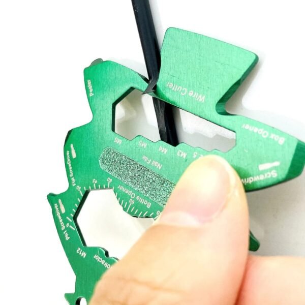 Christmas Tree Keychain Multitool stripping a wire