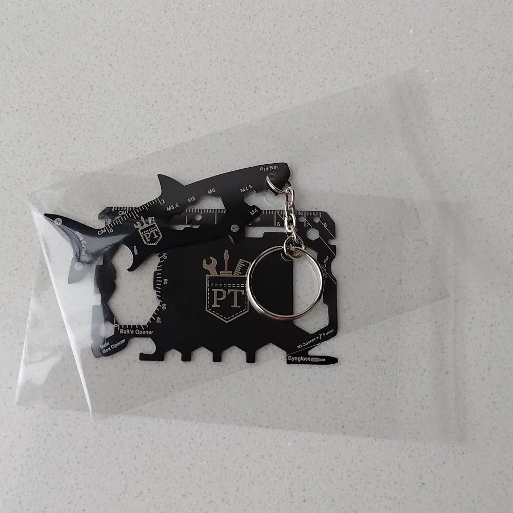 Plastic Film packaging with Shark keychain and Credit Card Multitool 2 in them