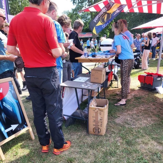 Visitors in line to choose one of 2 Pocket Tools