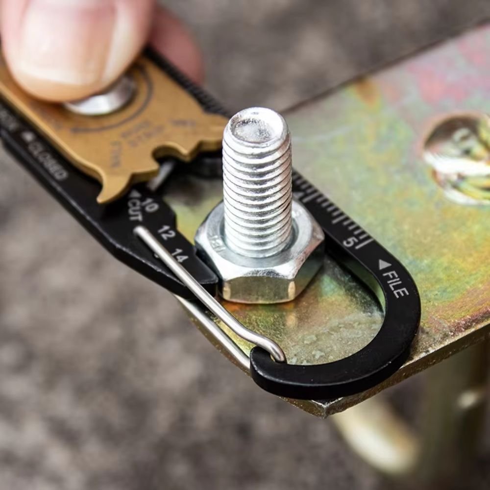 Carabiner Multitool used to tighten a nut
